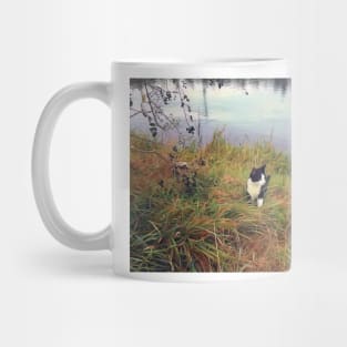 Hunting cat by a lake Mug